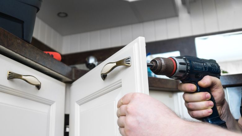 Utilize the Inside of Cabinet Doors with DIY Utensil Holders